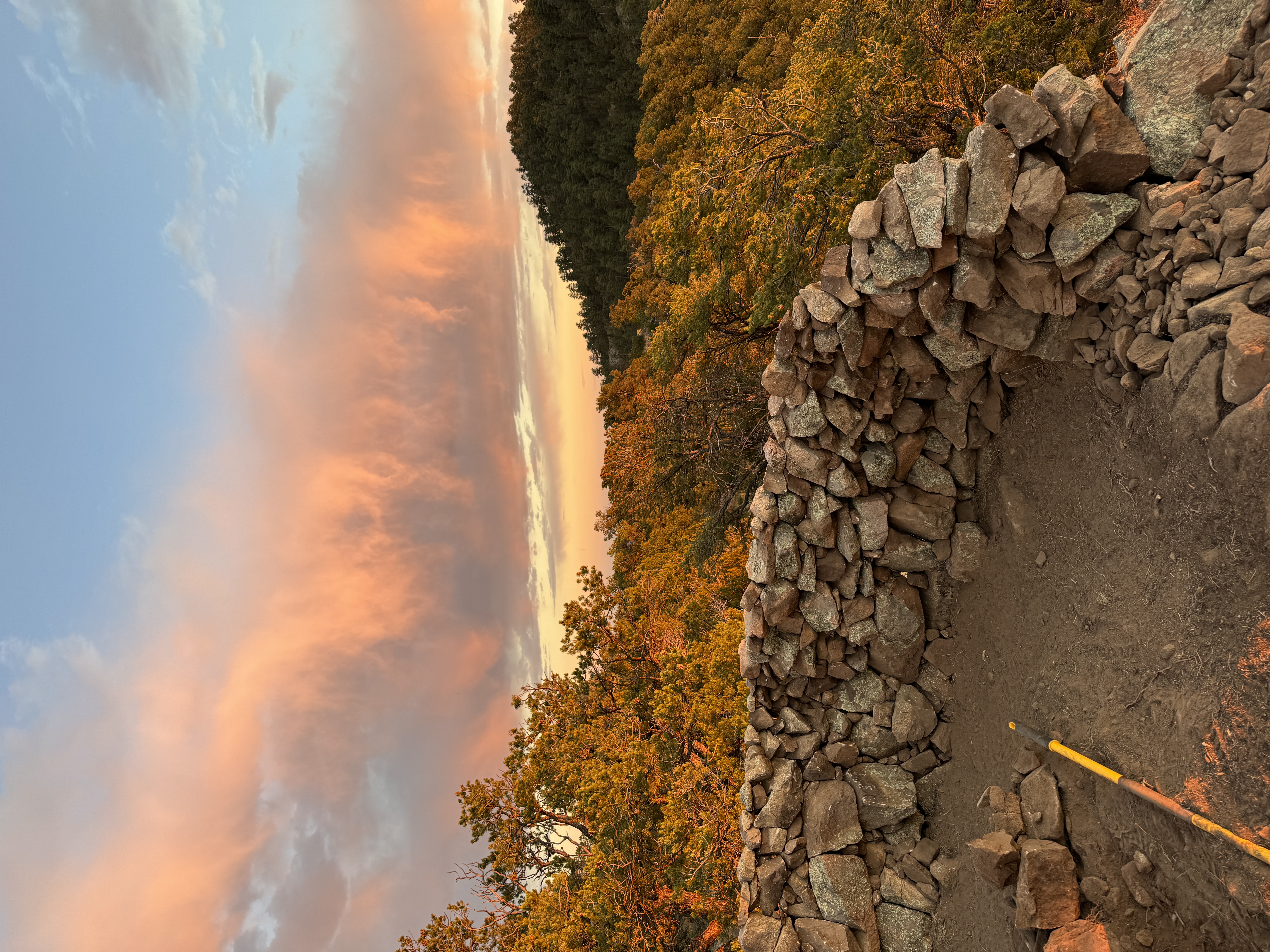 Stone wall along ridge — fall foliage, sunset clouds